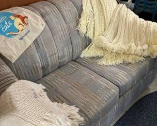 Love seat that makes out into a bed.  All the convenience, without the weight!