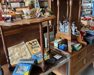 The garage is full of furniture - lots of different pieces - and seasonal gifts and decorations.  