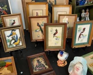 The smaller standing pictures are complemented with real feathers.  You just have to see them.