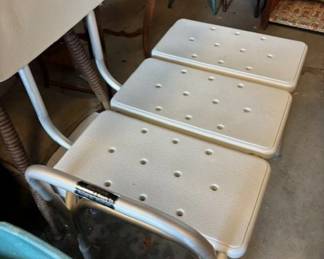 Shower chair with extra space.