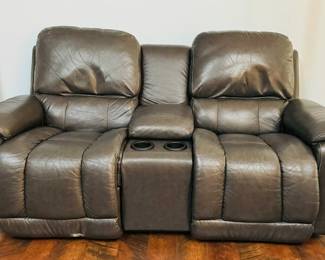 (Two) Leather La-Z-Boy recliner loveseats, with storage in the center console and drink holders. Good shape.
