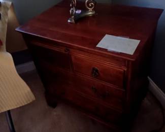 The Old Salem Collection . From Lexington Furniture Industry. Commode w/4 drawers & a pullout shelf. Blue lamp.