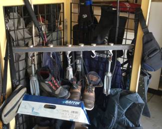 Fishing boots, sm anchors, net, bag, life vest, winter boots.
