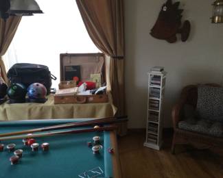 Bowling balls, suitcase full of MAGIC TRICKS.