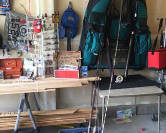 Fishing stuff; float tube, Sage & Remington fly rods & Lamson fly reel. Asst rods & reels, box of fly tying things, asst tackle.