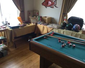 Bumper pool table, old violin, various games, Wii game system (lots of parts), Life mags, newspapers, bowling balls & bags,