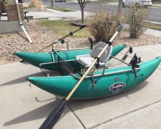 8’ long inflated pontoon boat w/oars,seat & anchor w/ rope.