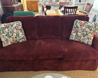Corduroy Couch with decorative pillows.