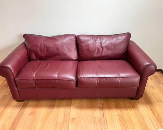 Classic Red Genuine Leather Couch (has some minor pet wear and tear) 
Beautifully Crafted by Temple INC 
