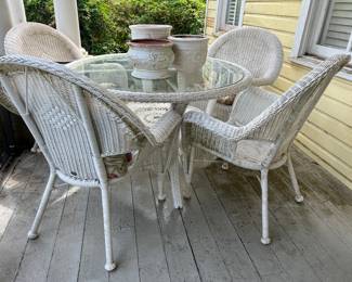 All weather wicker table and 4 chairs