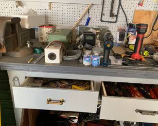 Cabinets full of tools not sorted out yet.