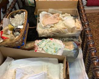 We have a large amount of doll clothes for 1800’s, early 1900’s dolls.  Beautiful needlework!