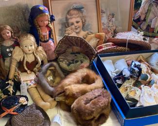 Muffs, hats, shoes, dolls, pictures