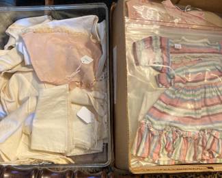 Some clothes for small vintage dolls as well as for antique dolls