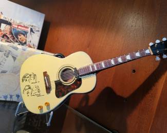 John Lennon (The Beatles) miniature 10" replica guitar