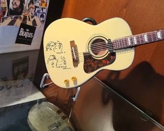 John Lennon (The Beatles) miniature 10" replica guitar