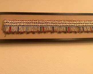 $290 Bead and shell African belt  beautifully framed. 34"w x 9.75"h.  Available during  online beginning sale beginning Wednesday, May 8th at 8am and ending Thursday May 9th at 4pm.   Click on message seller to let us know you want to purchase it and we will reply with next steps.