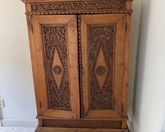 $650. Asian influence armoire.  40.5" x 14.5" x 69"h.  Available during  online beginning sale beginning Wednesday, May 8th at 8am and ending Thursday May 9th at 4pm.   Click on message seller to let us know you want to purchase it and we will reply with next steps.