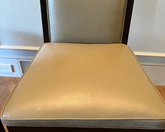 A close up of the dining chairs, color is less yellow than this photo.