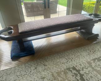 $2800.  Vintage Ayurvedic carved massage table  from India set on a custom base from Live Edge.  Bench is 10'4" at the widest part, 25"d x 20.5"h.  Custom cushion.Available during  online beginning sale beginning Wednesday, May 8th at 8am and ending Thursday May 9th at 4pm.   Click on message seller to let us know you want to purchase it and we will reply with next steps.