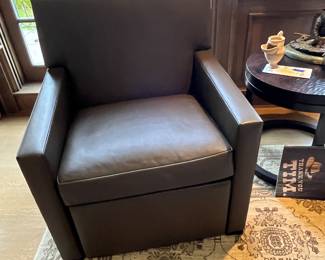 $1100 Terry Hunziker custom leather recliner.  32 inches wide x  2.5 inches deep by 37 inches high.  Originally $2530.  Available during  online beginning sale beginning Wednesday, May 8th at 8am and ending Thursday May 9th at 4pm.   Click on message seller to let us know you want to purchase it and we will reply with next steps.