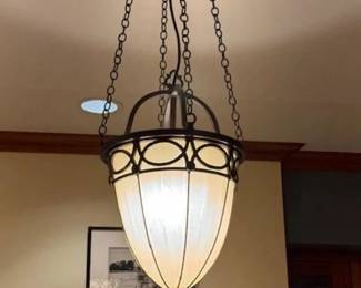 $250. Bronze and glass pendant light.  17"chain, 11"diameter. as shown it is a 32"drop from the ceiling. Originally $1323 each.  Two available
