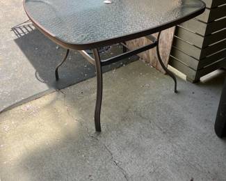 $40. Tropitone metal and glass outdoor table. 42"sq. x 28.5"h.  Available during  online beginning sale beginning Wednesday, May 8th at 8am and ending Thursday May 9th at 4pm.   Click on message seller to let us know you want to purchase it and we will reply with next steps.