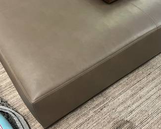 $1900. Custom leather and blackened steel base ottoman,    It  is  60” x 48” x 14”h.  Originally $4660. 
 Available during  online beginning sale beginning Wednesday, May 8th at 8am and ending Thursday May 9th at 4pm.   Click on message seller to let us know you want to purchase it and we will reply with next steps.