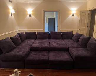 $2800. Mitchell Gold Dr. Pitt sectional collection sofa.  Back section is 124"w and side sections are 96" each.  Sofa portions are each 36"h Front section with the ottomans is also 124"w.  Sectional is comprised of two armless loveseats, 2 tall ottomans and 2 short ottomans.  Available during  online beginning sale beginning Wednesday, May 8th at 8am and ending Thursday May 9th at 4pm.   Click on message seller to let us know you want to purchase it and we will reply with next steps.