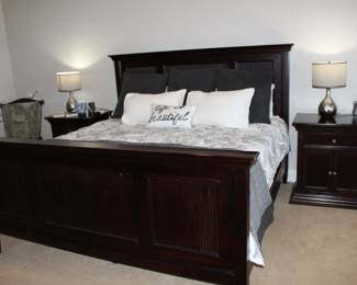 Solid wood bed frame - the bedding is Pottery Barn, sheets in king size by Cozy Earth, nightstands are very nice and have the felt padding inside the top drawer