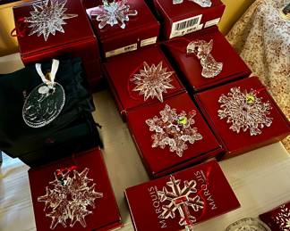 Dozens of Waterford snowflake ornaments