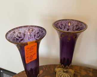 $60 pair of purple and brass base trumpet vase. one missing top brass ring. 14H