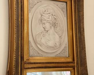 #6 - $595 Pair of gilt wood frame with bisque plaques.