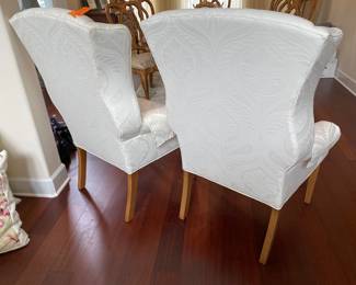 #23 - $300 - Set of Thomasville wing back chairs - Cream upholstery. No stains