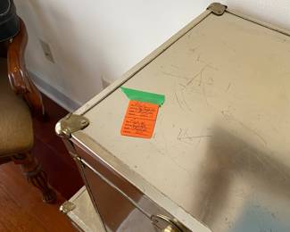 $60 - Two gold trunks