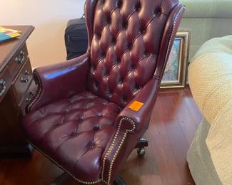 #58 - $200- Office chair red tuffed leather wing back