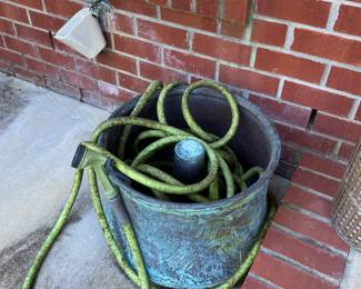 #116 $60 Hose in storage bin. (copper)