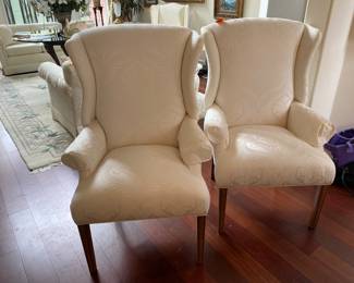 #23 - $300 - Set of Thomasville wing back chairs - Cream upholstery. No stains