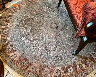 #100 - $200 - Round rug - 81"D