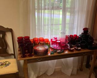 Console table, set of Ruby Ware glassware, Ruby thumbprint plates, Rubina Verde-type tumblers, Cranberry to Clear Lemonade set with tray