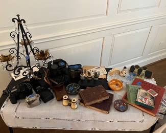 Tiffany lighters
Vintage binoculars
Cameras