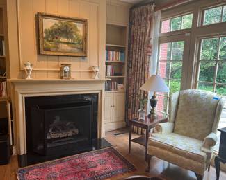 Oil painting
French mantle clock
Sarouk rug
Wing chair