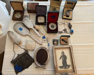 Tiffany clocks
Sterling bag, frames
Misc sterling