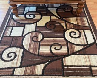 Brown & cream scrolled modern area rug,  5' x 8",  was $40, Now $20
