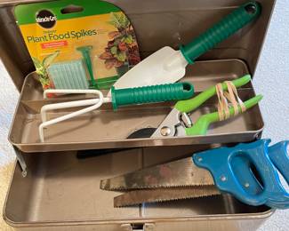 Metal Tool Box w/Misc. Garden and Two Small Saws,  was $12, NOW $9