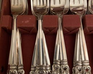 Closeup view of International Sterling Flatware ~