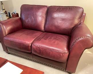 Burgundy leather love seat with nail head trim,  65"W x 39"D x 36"H, was $399, NOW $245