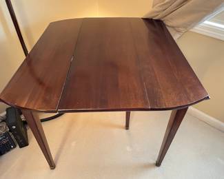 Additional view of adjustable dining table with leafs dropped ~