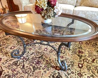 Oval glass coffee table with metal legs, 22"H x 50"L x 30"D,  was $195, NOW $125