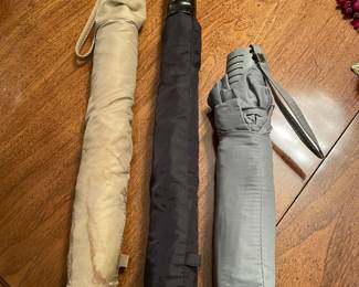 Tan umbrella, was $5, NOW $4.  Black Totes umbrella, was $6, NOW $4.  Grey Umbrella,  was $5, NOW $3
